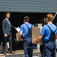 depositphotos_400159298-stock-photo-selective-focus-businessman-holding-clipboard